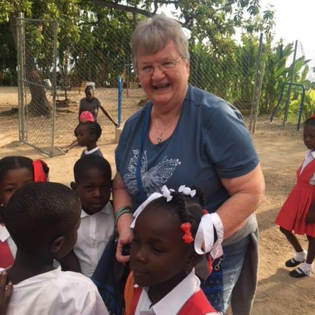 Volunteer Diane Hauenstein enjoying her volunteer trip in Haiti last year.